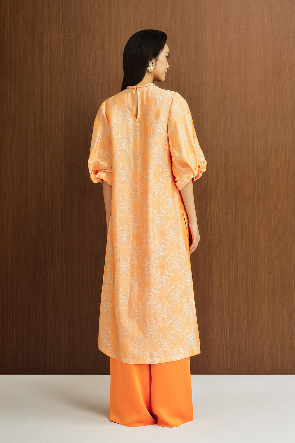 Giai Ky Straight Puffy Sleeved Silk Calf Length Ao Dai