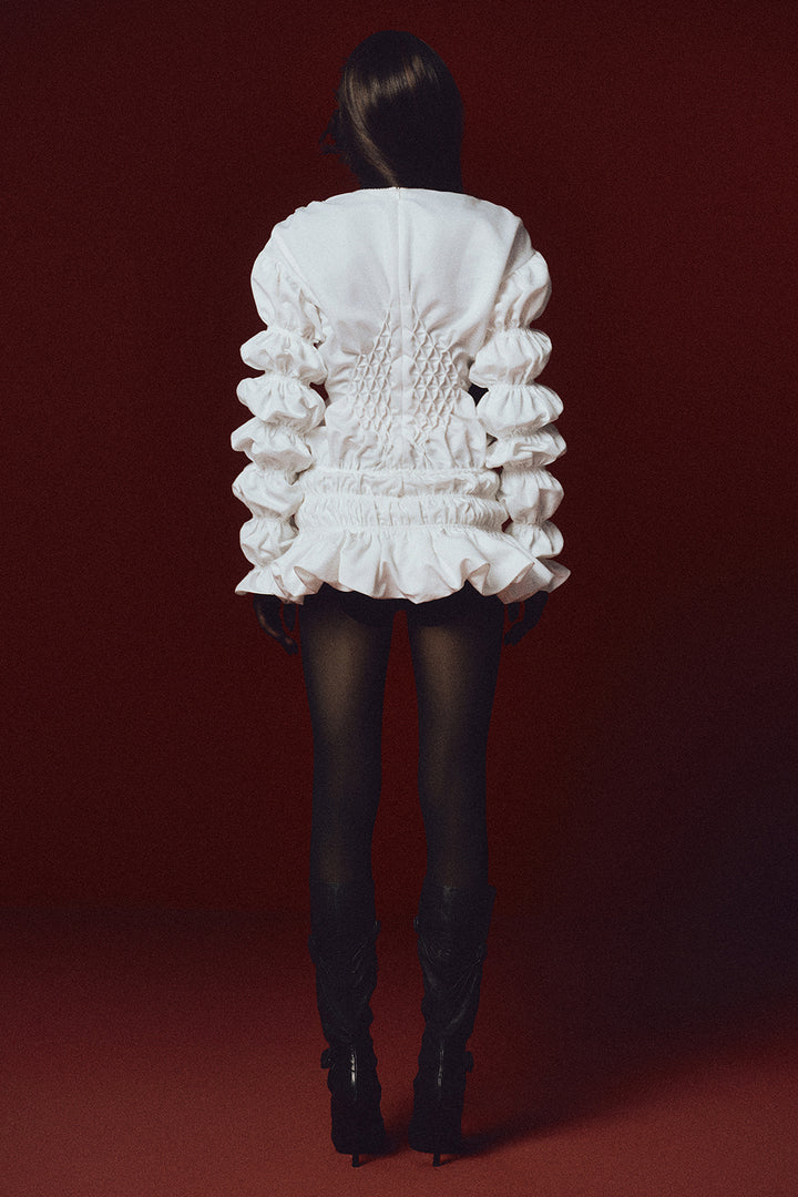 The Swan of Avon Peplum Smocking Mini Dress - MEAN BLVD