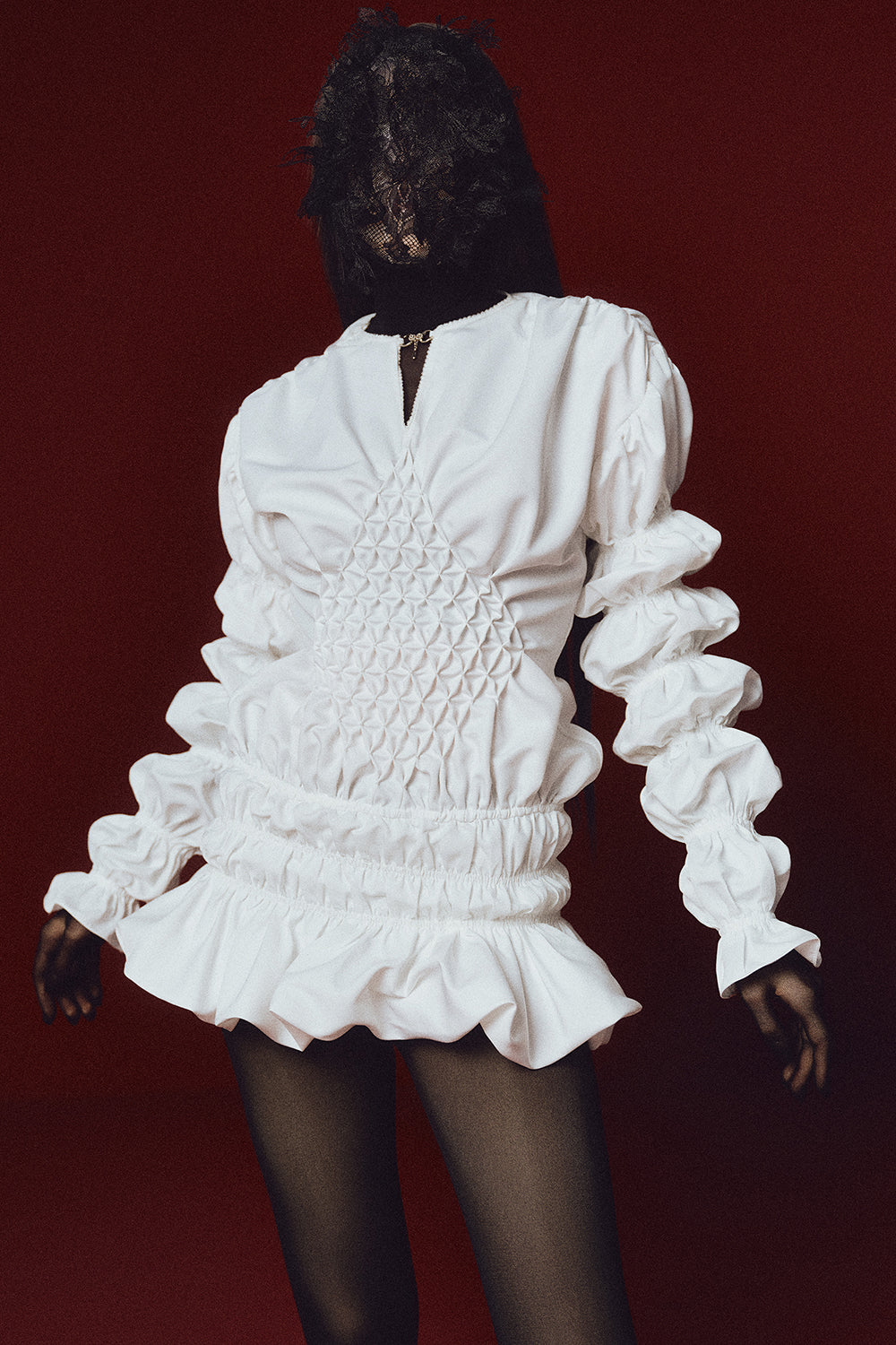 The Swan of Avon Peplum Smocking Mini Dress - MEAN BLVD